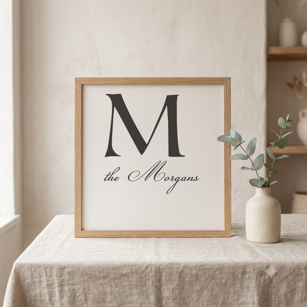 Roman Monogram and Champignon monogram font pairing on a framed initial and name print mockup