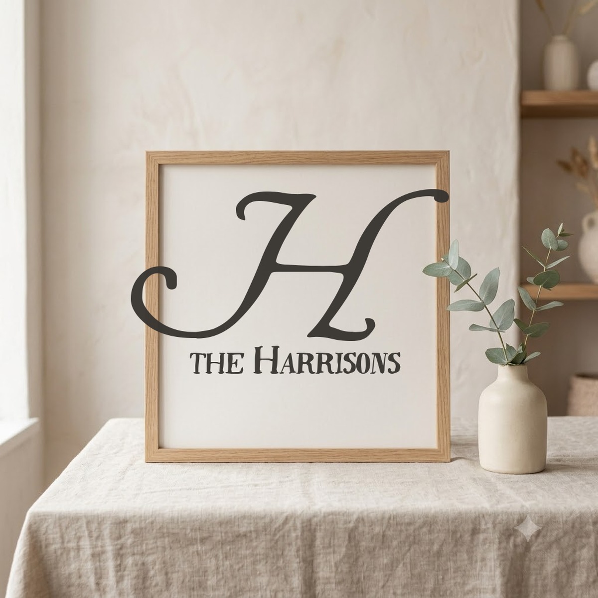 Wrenn Initials and Quincy monogram font pairing on a framed initial and name print mockup